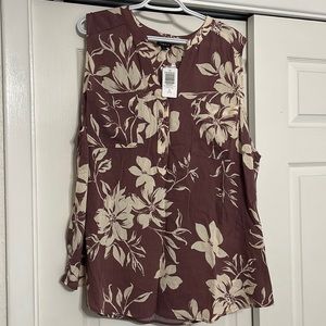 Torrid size 3 sleeveless shirt with tags.